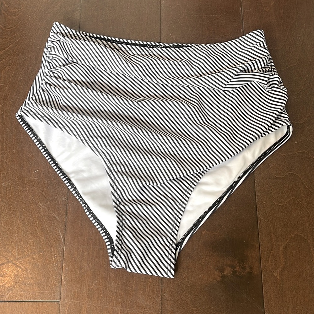 Brand new, never worn swimsuit bottoms, colorful ones, and black and white ones